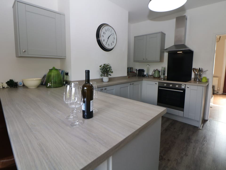 Fridge, dishwasher, electric kettle, cookware/dishes/utensils