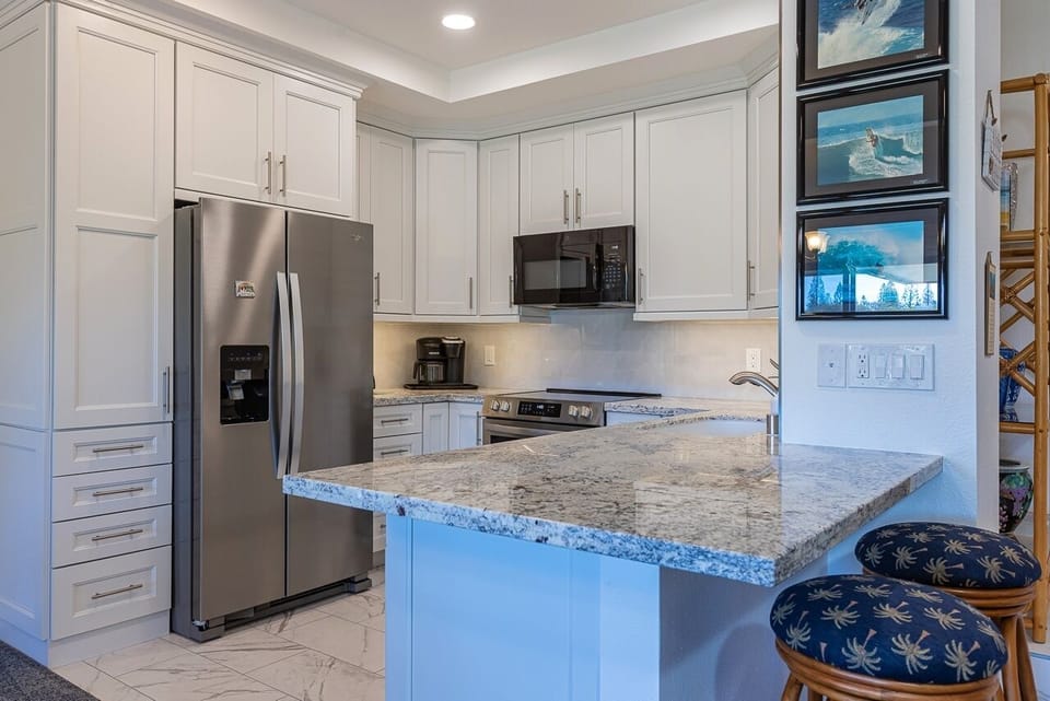 Condo, 2 Bedrooms | Private kitchen | Coffee/tea maker, fridge, oven, stovetop