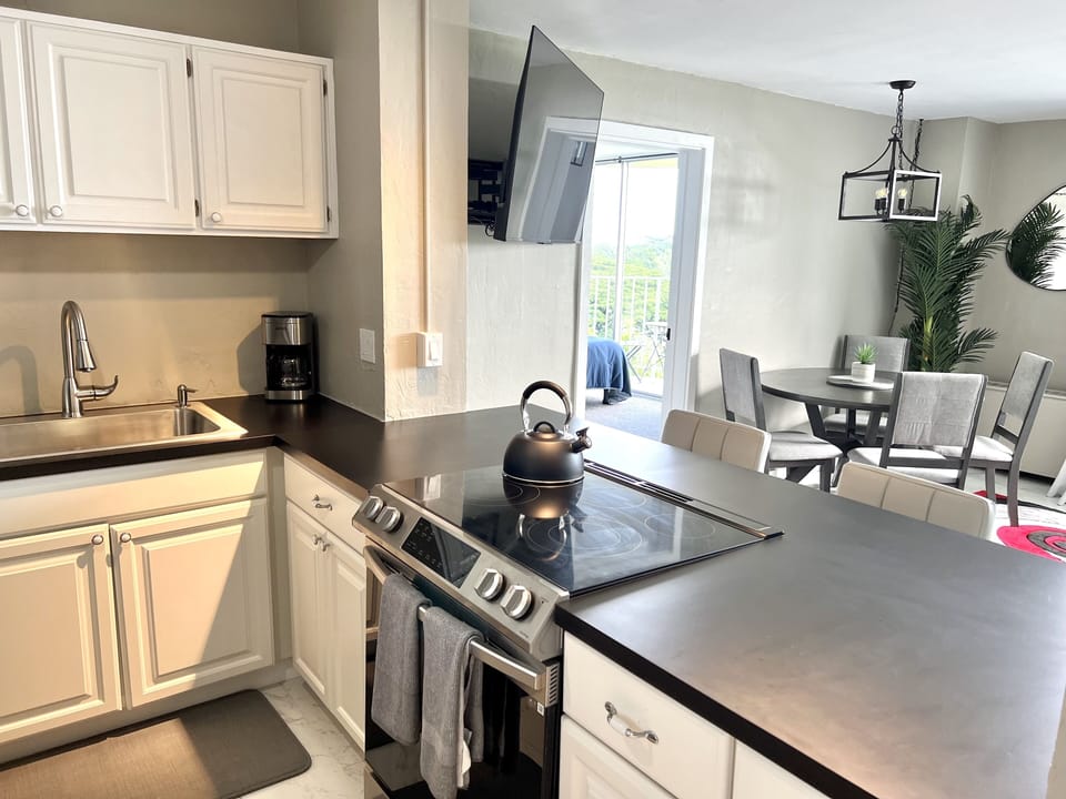 Condo | Private kitchen | Full-size fridge, microwave, oven, stovetop