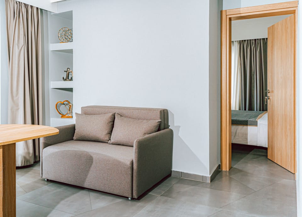 Deluxe Apartment, 1 Bedroom, City View | Living area | 32-inch flat-screen TV with digital channels