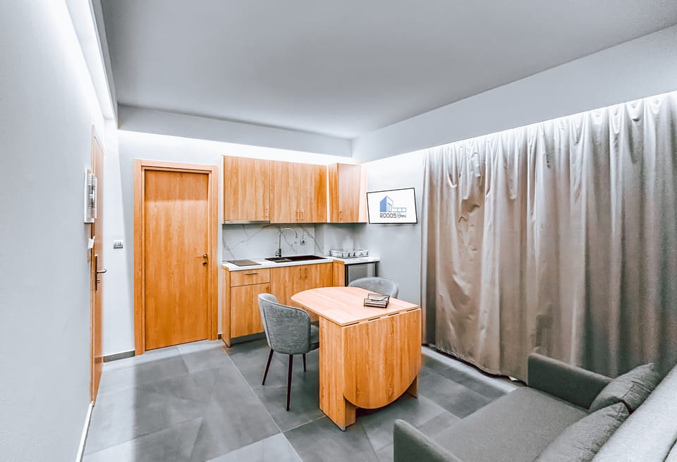 Deluxe Apartment, 1 Bedroom, City View | Living area | 32-inch flat-screen TV with digital channels