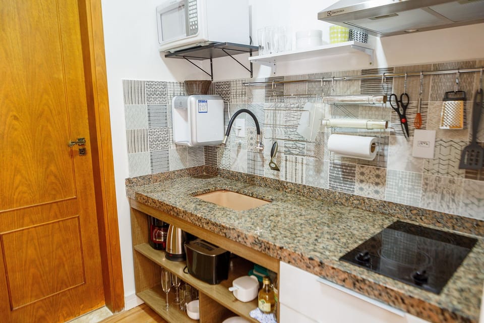 Villa | Private kitchen | Fridge, microwave, cookware/dishes/utensils