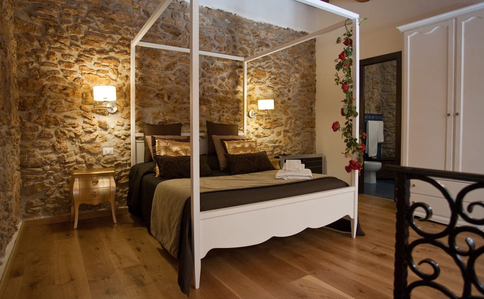 Deluxe Suite, Jetted Tub | 1 bedroom, Frette Italian sheets, premium bedding, down comforters