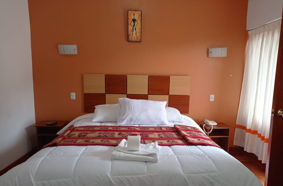 Down comforters, desk, free WiFi, bed sheets