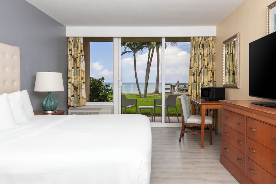 Suite, 1 Bedroom, Oceanfront (King) | Hypo-allergenic bedding available, in-room safe, desk, blackout drapes