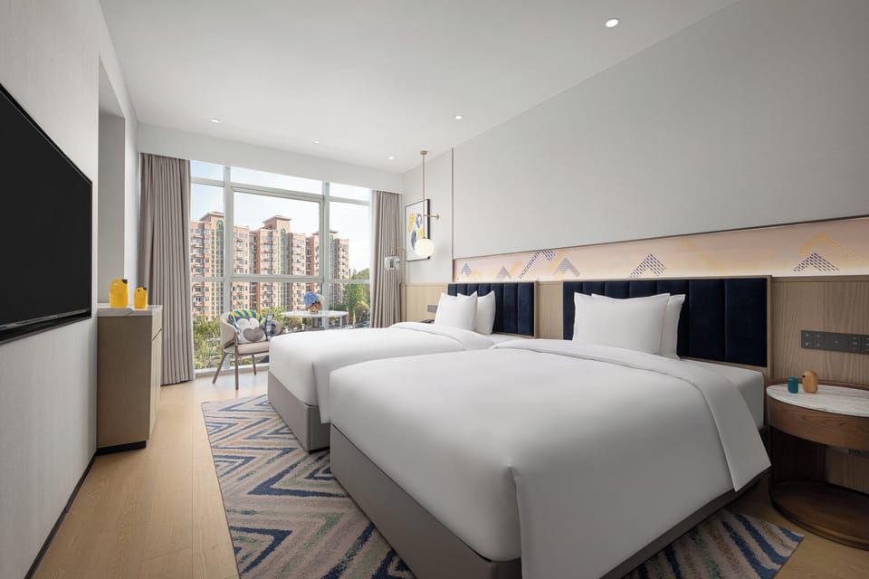 Standard Room, 2 Double Beds | Minibar, in-room safe, blackout drapes, iron/ironing board
