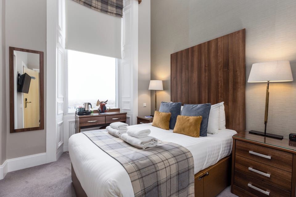 Double Room (Double room with a view) | Iron/ironing board, free WiFi, bed sheets