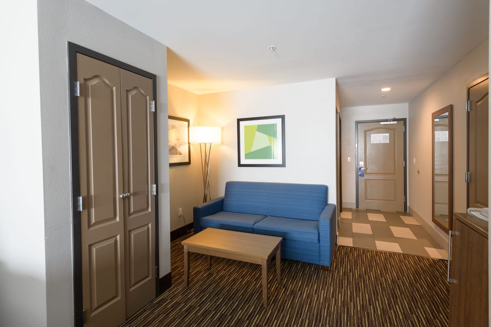 Suite, 1 King Bed | In-room safe, desk, iron/ironing board, free cribs/infant beds
