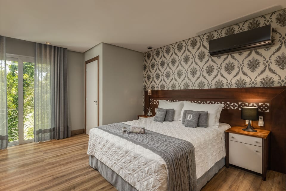 Deluxe Double Room, 1 Queen Bed | 1 bedroom, premium bedding, minibar, in-room safe