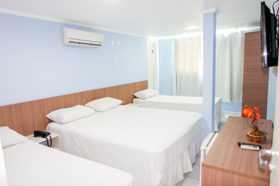Quadruple Room (Suite) | Minibar, desk, laptop workspace, free WiFi