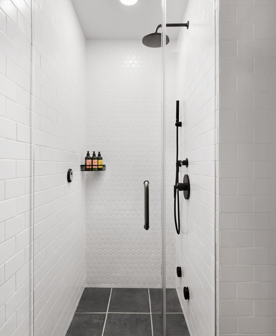 Suite (Manhattan) | Bathroom | Shower, designer toiletries, hair dryer, bathrobes