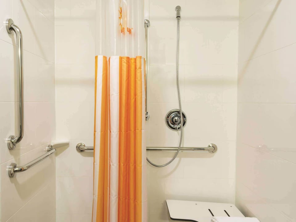 Deluxe Suite, 1 King Bed, Accessible, Non Smoking (Mobility Accessible) | Pillowtop beds, desk, iron/ironing board, WiFi (free)