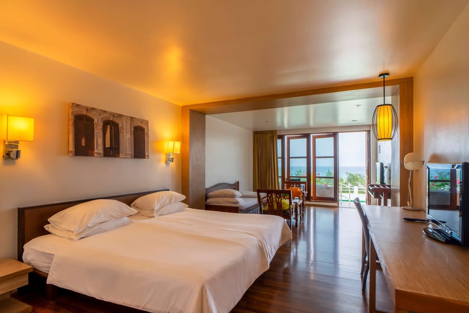 Family Room, 1 King Bed, Non Smoking, Oceanfront (with Sofabed) | In-room safe, individually furnished, desk, blackout drapes
