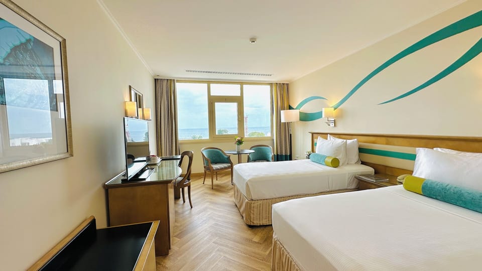 Standard Twin Room (with View) | Pillowtop beds, minibar, in-room safe, individually furnished