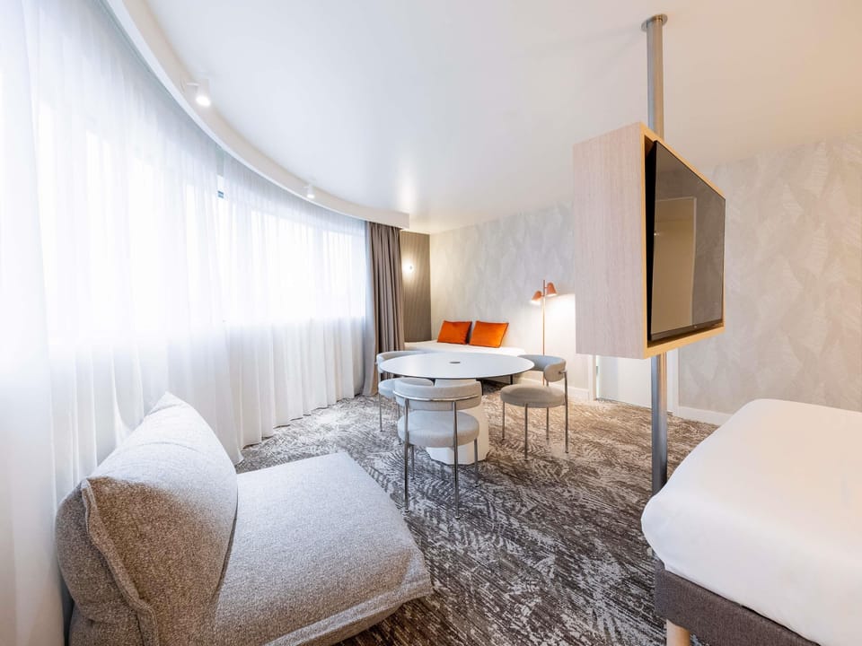 Studio (2 people) | Minibar, in-room safe, individually decorated, individually furnished