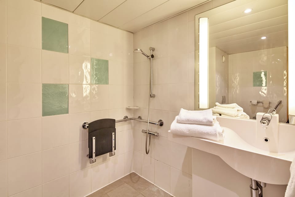 Double Room, Mobility Accessible | Bathroom | Shower, hair dryer, towels, soap