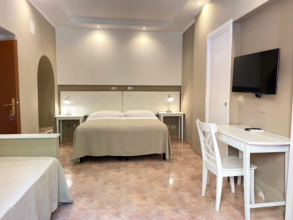 Standard Triple Room | Desk, laptop workspace, free WiFi, bed sheets