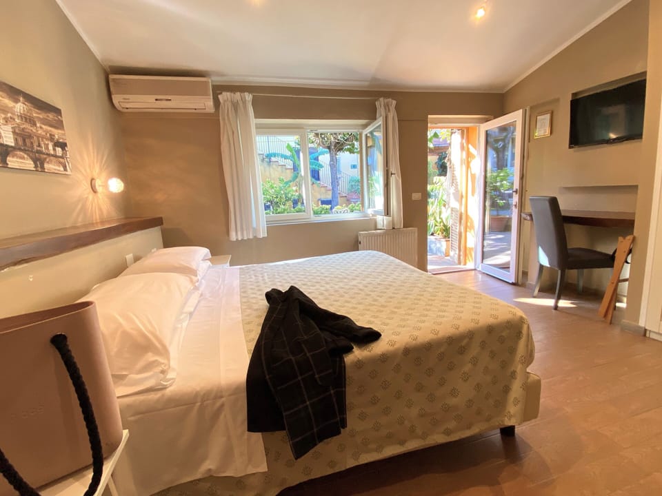 Desk, laptop workspace, free WiFi, bed sheets
