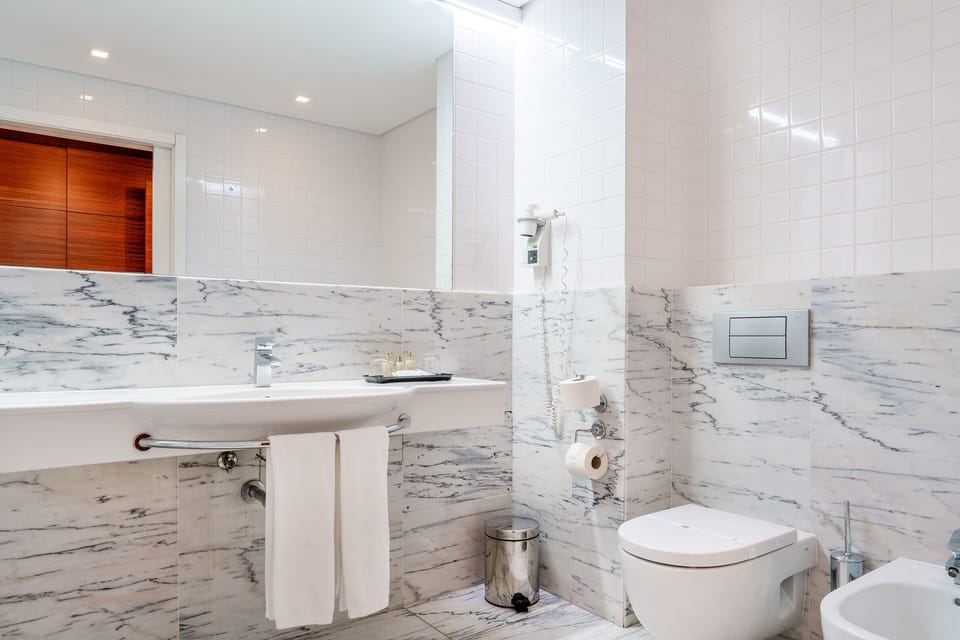 Free toiletries, hair dryer, bidet, towels