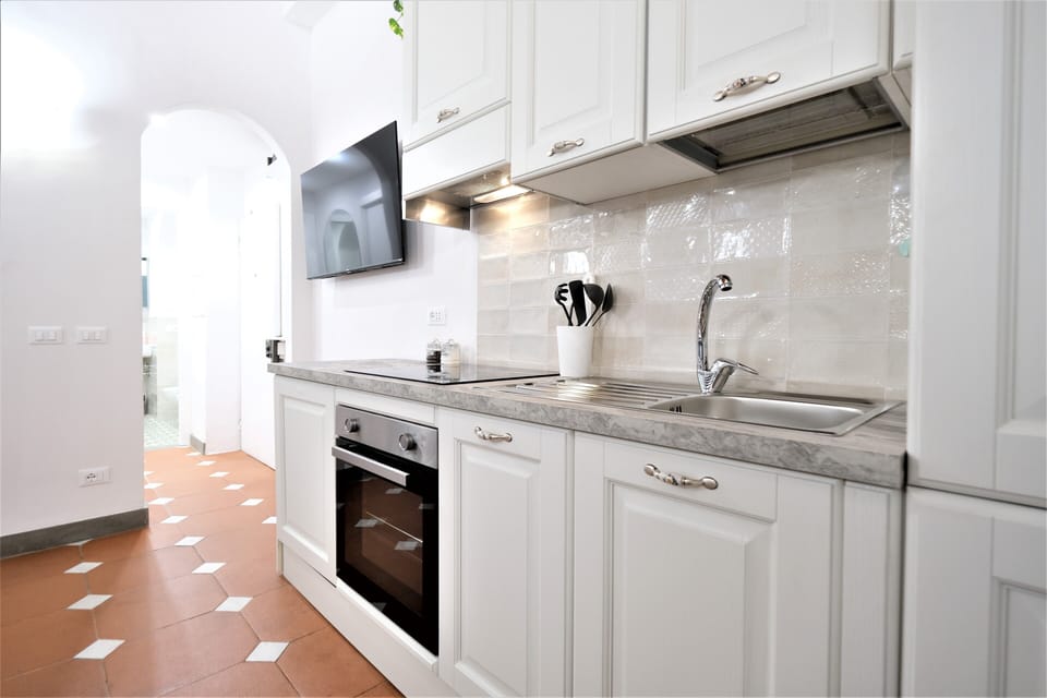Apartment | Private kitchen | Fridge, microwave, oven, stovetop