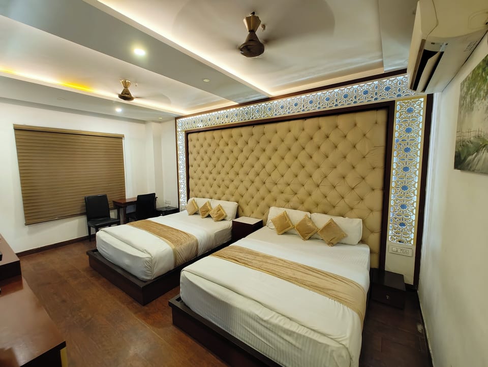 Family Room | Premium bedding, in-room safe, desk, laptop workspace
