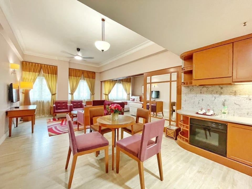 Suite, 2 Bedrooms | Living area | 42-inch flat-screen TV with satellite channels
