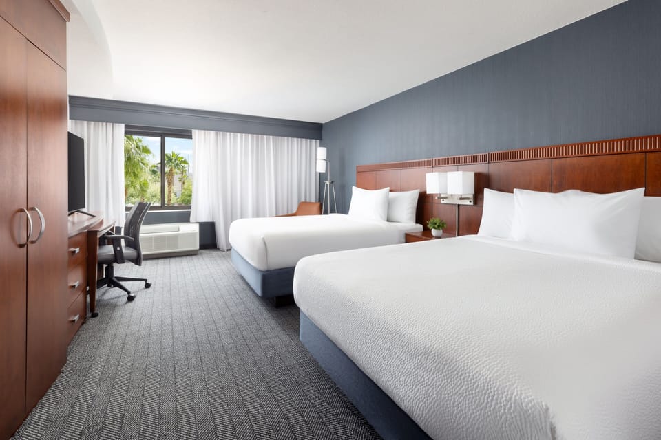 Hypo-allergenic bedding available, in-room safe, desk