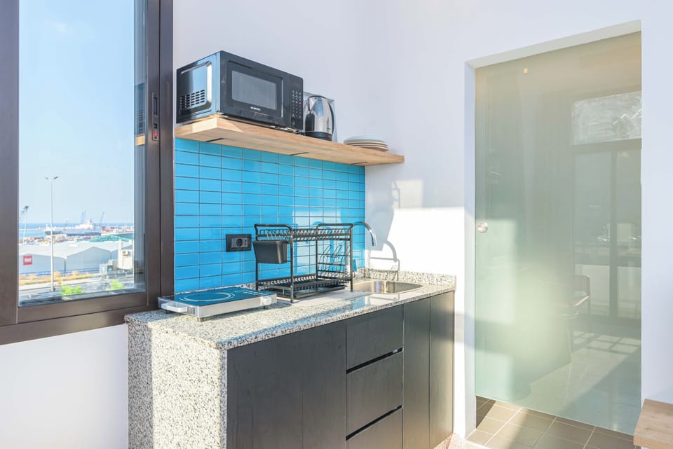 Anoor 102 | Private kitchenette | Full-size fridge, microwave, stovetop, electric kettle