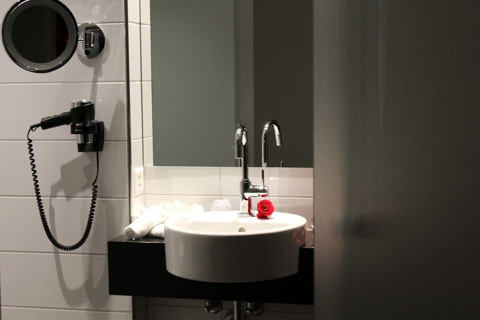 Hair dryer, towels, soap, shampoo