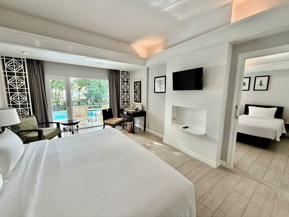 Family Connecting Lagoon Pool Access | Minibar, in-room safe, individually furnished, desk