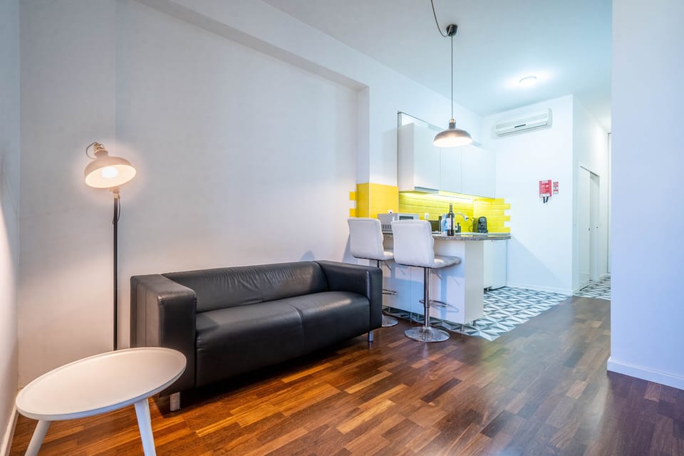 Standard Studio | Living area | 1-inch flat-screen TV with cable channels