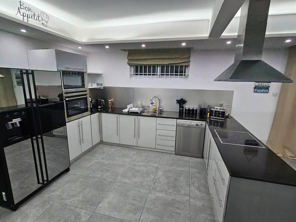 Villa | Private kitchen | Fridge, microwave, oven, stovetop