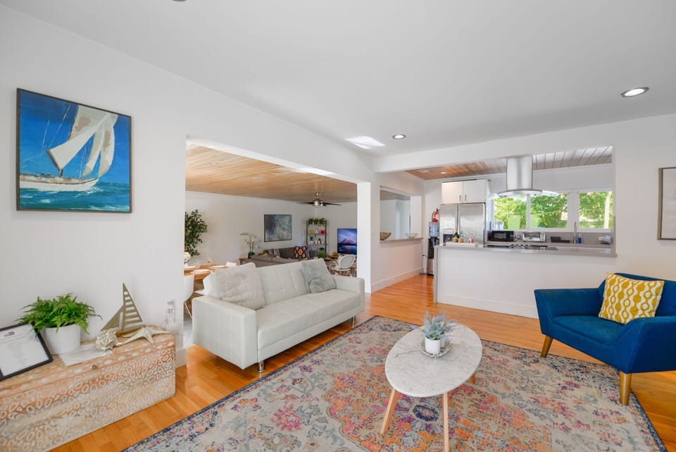 Deluxe Apartment | Living area | 50-inch plasma TV with digital channels, streaming services