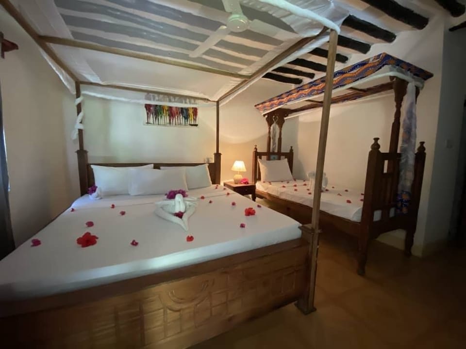 Family Triple Room, 4 Bedrooms | Egyptian cotton sheets, premium bedding, down comforters, bed sheets