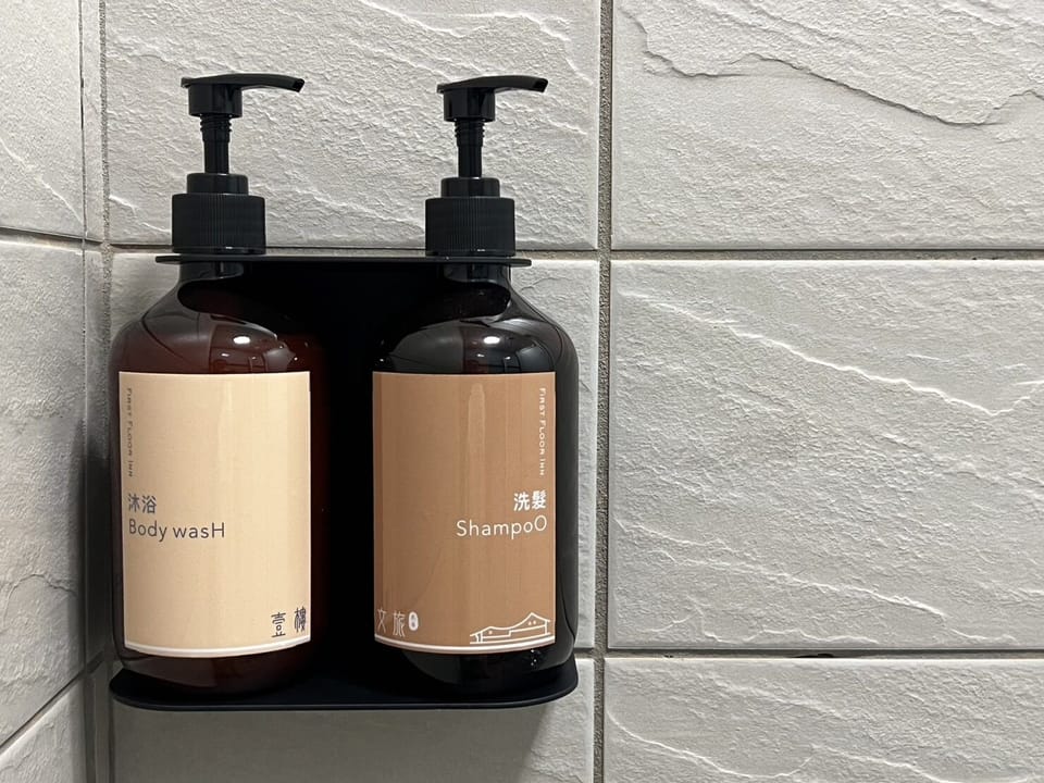 Shower, hydromassage showerhead, designer toiletries, hair dryer