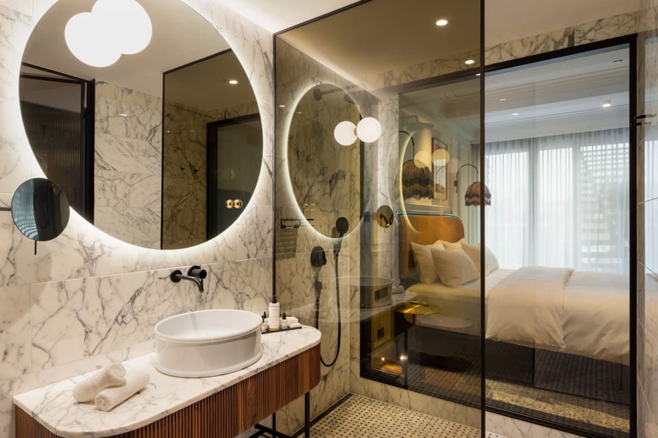 Premium Double Room, French Balcony, City View | Bathroom | Shower, rainfall showerhead, free toiletries, hair dryer