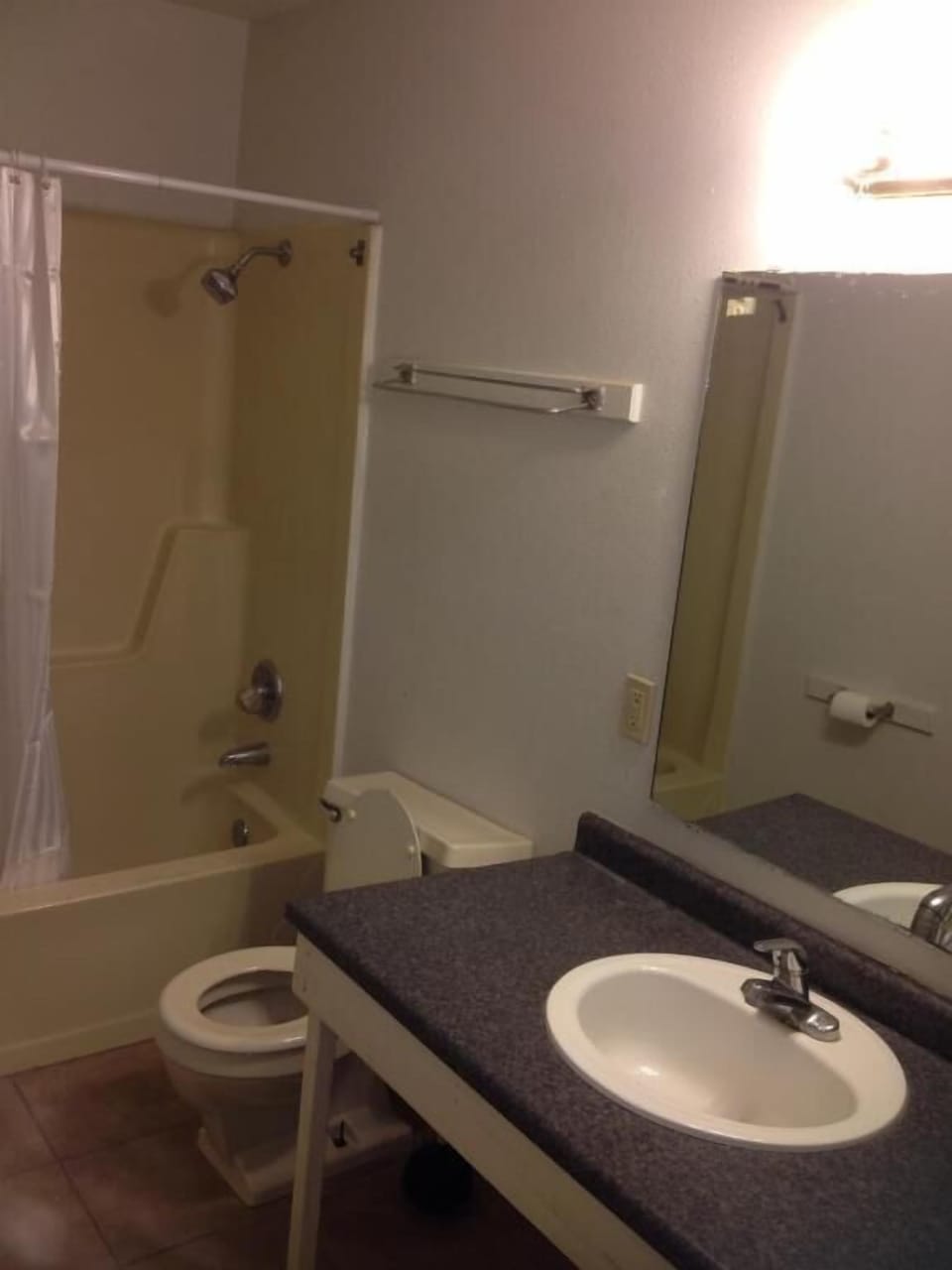 Shower, rainfall showerhead, towels, toilet paper