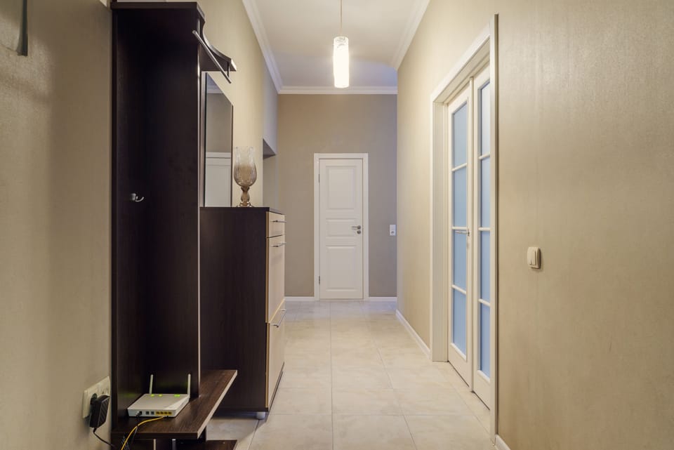 Apartment | Living area | 42-inch flat-screen TV with cable channels