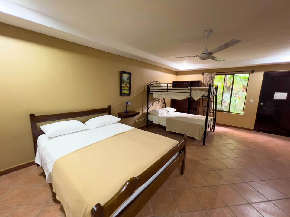 Standard Quadruple Room | In-room safe, soundproofing, free WiFi, bed sheets