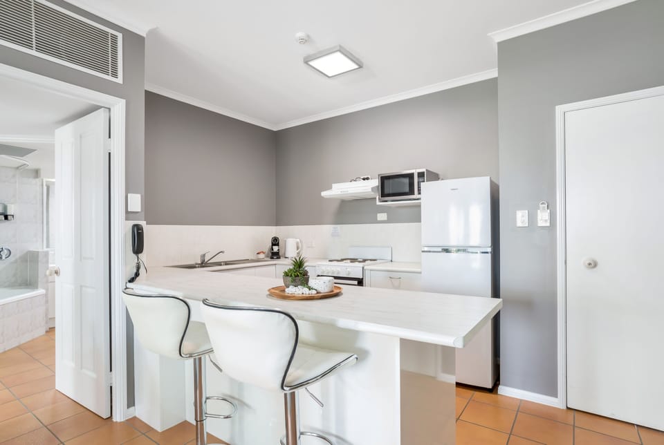 Comfort Apartment | Private kitchen | Full-size fridge, microwave, stovetop, dishwasher
