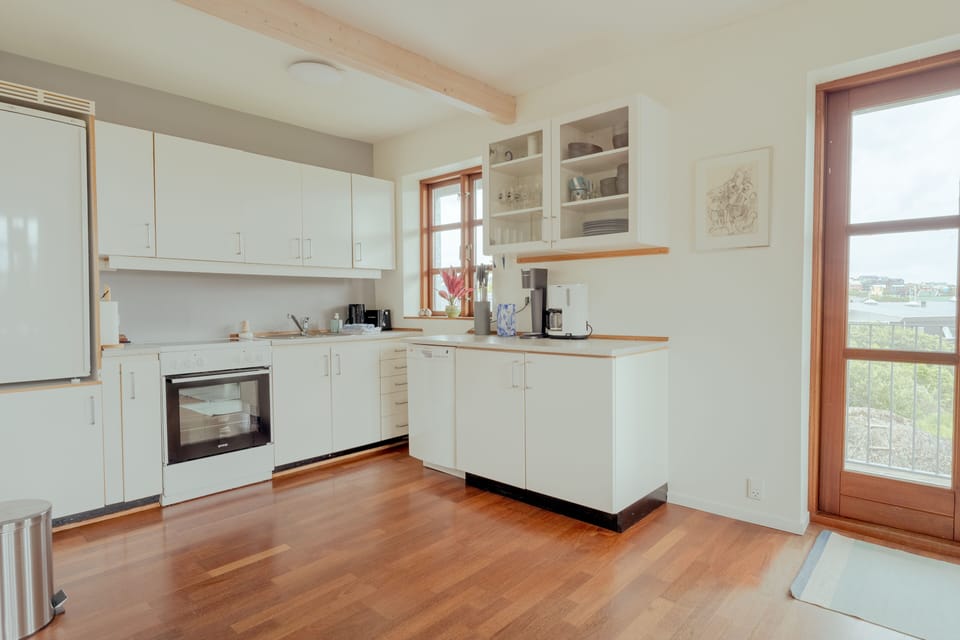 Apartment | Private kitchen | Coffee/tea maker, full-size fridge, oven, stovetop