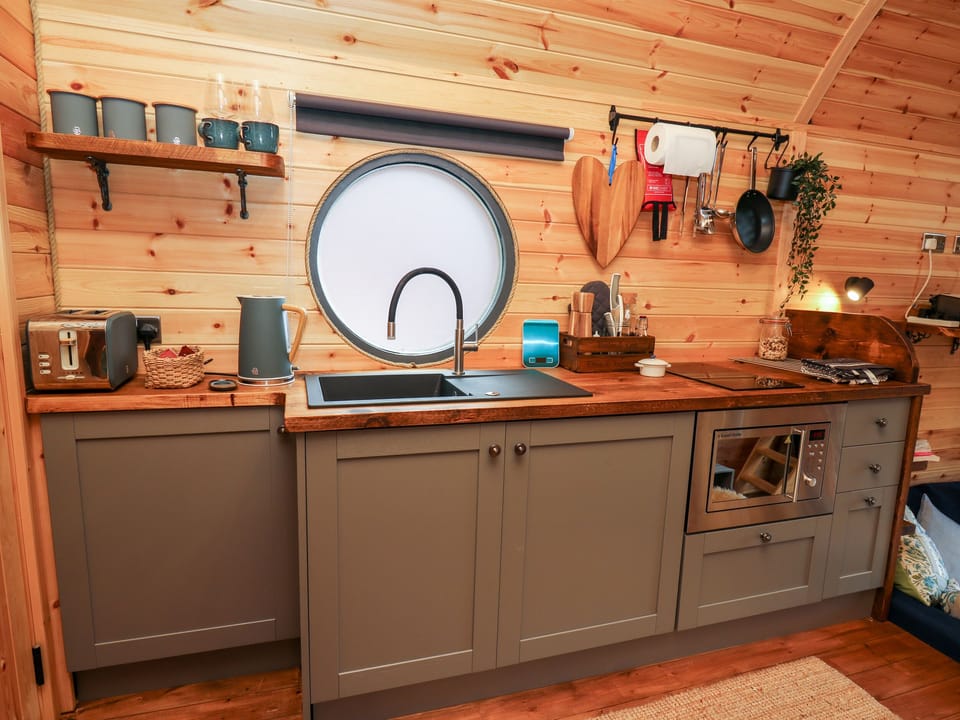 Fridge, electric kettle, cookware/dishes/utensils