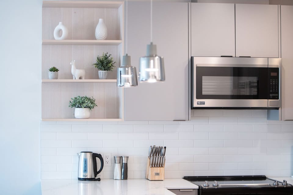 Condo | Private kitchen | Coffee/tea maker, full-size fridge, microwave, oven