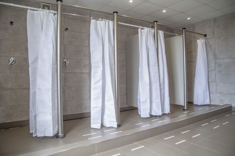 Shower, towels, toilet paper