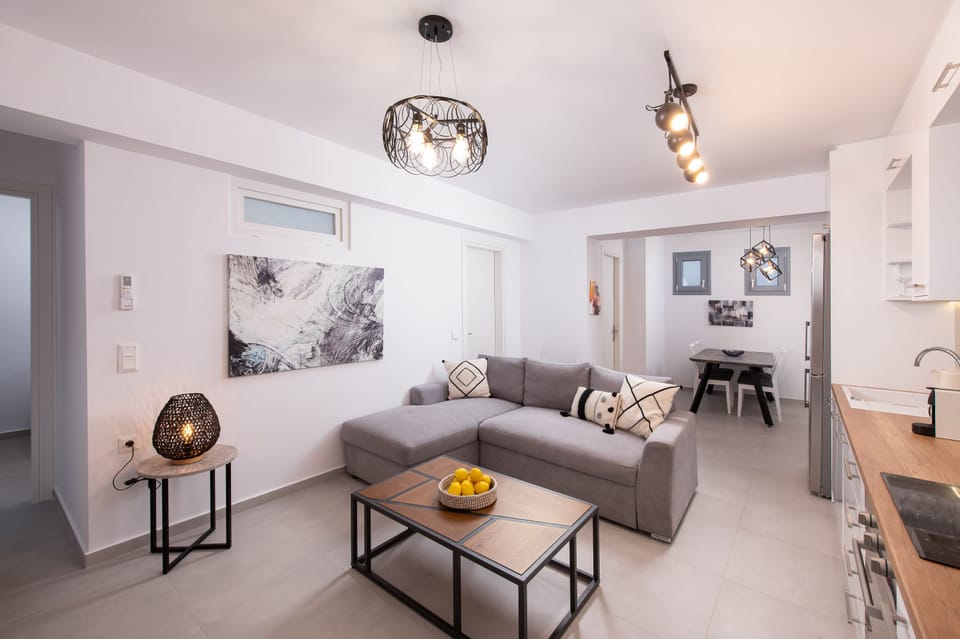 Economy Apartment, Private Bathroom | Living area | 55-inch Smart TV with digital channels, Netflix, streaming services