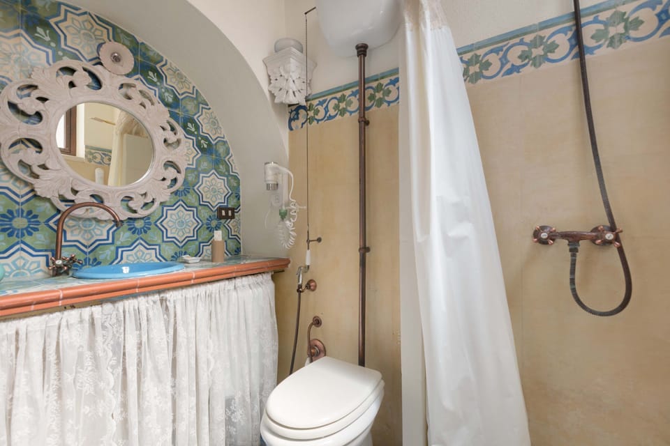 Room | Bathroom | Shower, rainfall showerhead, hair dryer, bidet