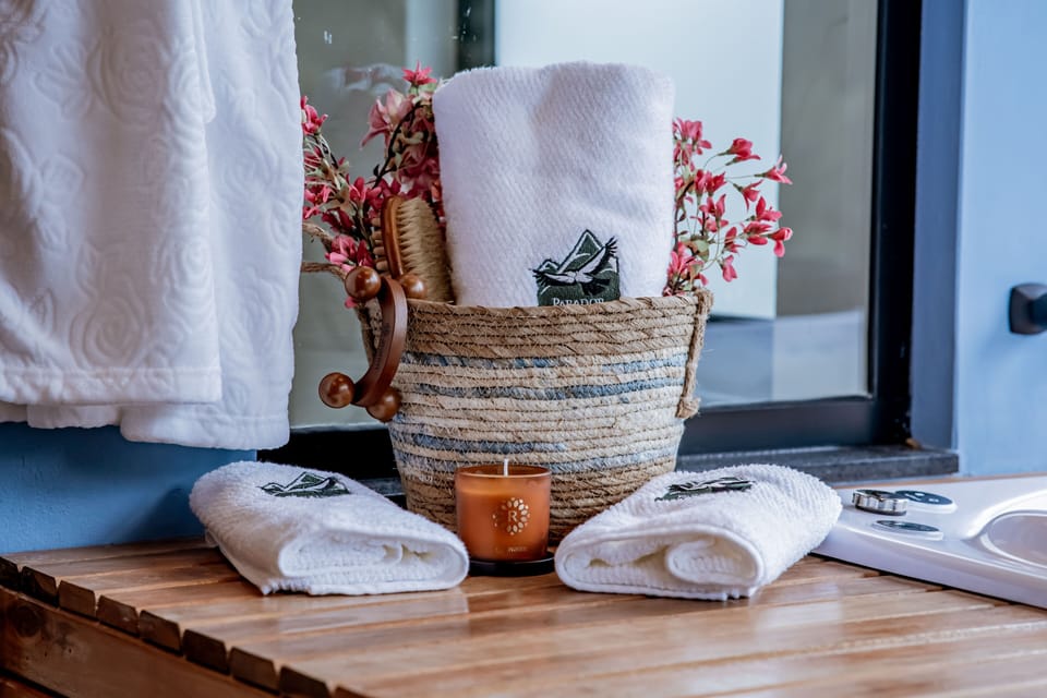 Separate tub and shower, slippers, towels