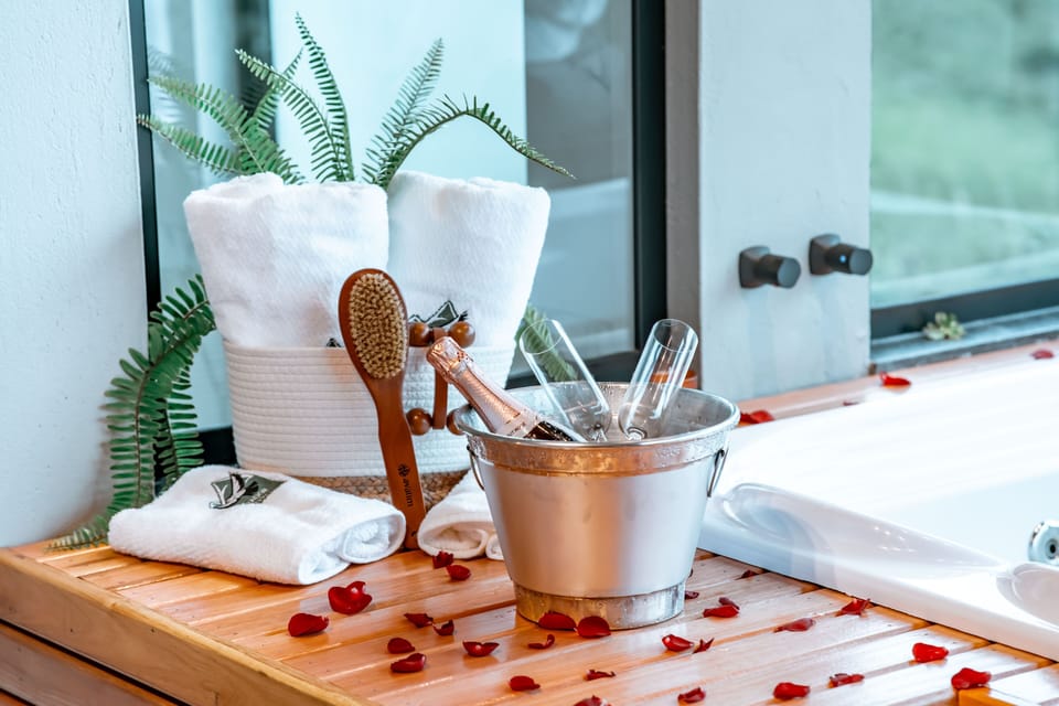 Separate tub and shower, slippers, towels