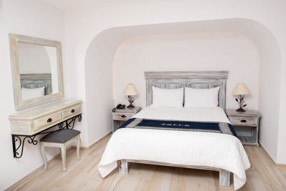 Comfort Room | Premium bedding, down comforters, blackout drapes, iron/ironing board