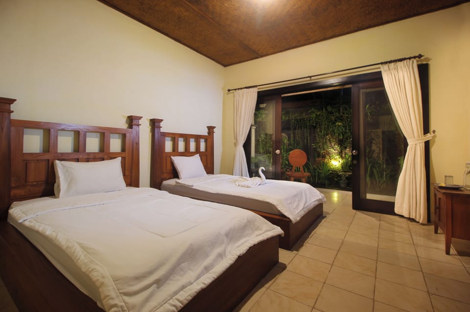 Twin Room | Blackout drapes, free WiFi, bed sheets